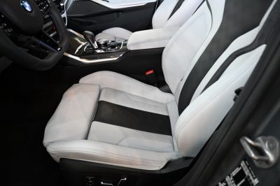 Sport seats with black inserts and carbon fiber center console in BMW interior