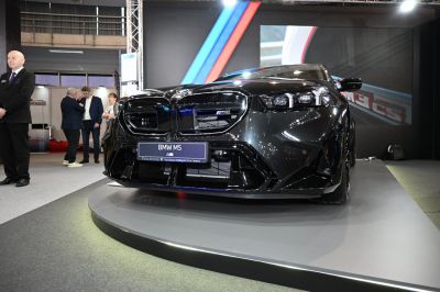 Front grille and LED headlights of a sporty luxury sedan