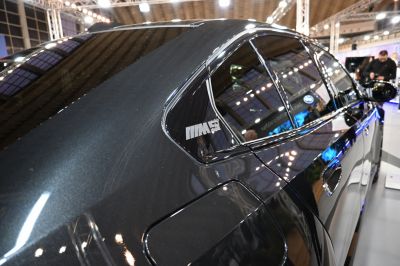 Close-up of side window with M5 badge and fuel door