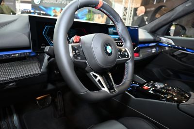Sport steering wheel with colored stitching and large dual digital displays