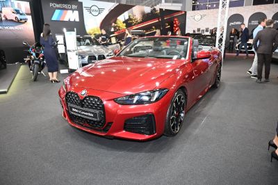 Red convertible with bold kidney grille and LED headlights