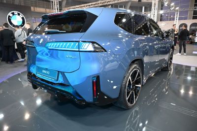 Rear and side view of blue SUV with modern taillights and alloy wheels