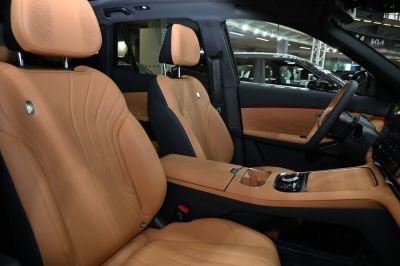 Tan perforated leather seats and modern center console