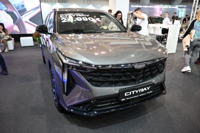 Bold front grille and sleek LED headlights on a modern vehicle front.
