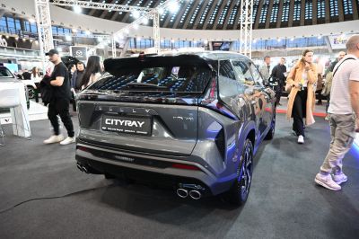 Rear view of a modern SUV with quad exhaust and distinct taillights