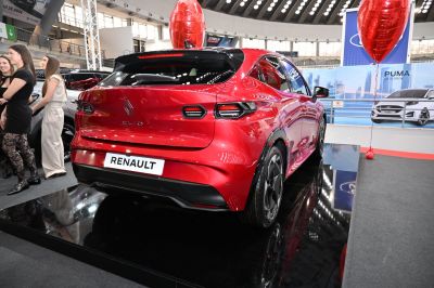 Rear view with distinctive LED taillights and aerodynamic hatchback design