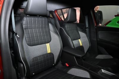 Quilted leather and fabric front seats with yellow striped accent