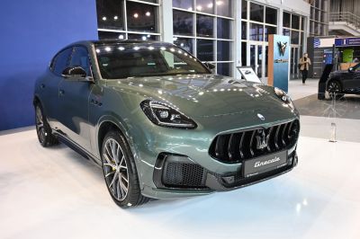 Aggressive front grille and sleek headlights of a luxury SUV.
