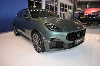 Front view of a luxury SUV with distinctive grille and LED headlights
