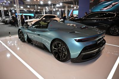 Sleek rear design with aerodynamic profile and performance wheels.