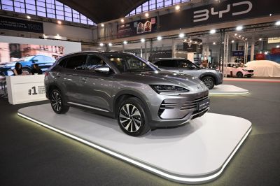Modern electric SUV with aerodynamic body and LED headlights