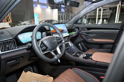 Digital instrument cluster and large central touchscreen in modern electric SUV interior