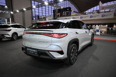 Rear view of a white SUV with LED tail lights and modern sharp design.