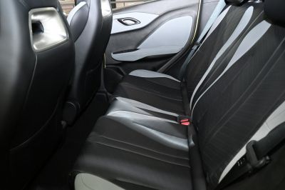 Modern two-tone rear seats with premium upholstery and comfort features