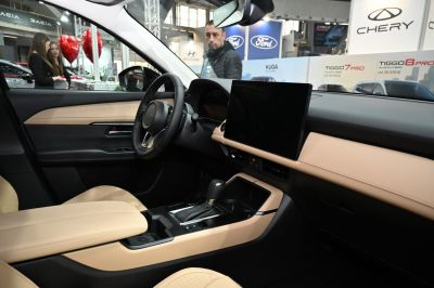 Beige leather seats and large touchscreen dashboard