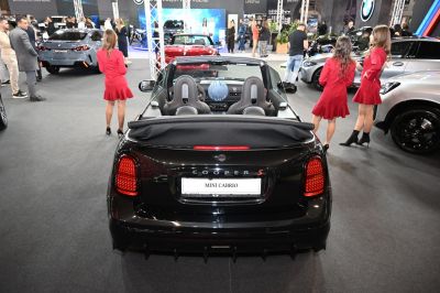 Rear view of convertible with open roof and modern taillights