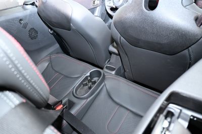 Rear seats with red stitching and central cup holder console