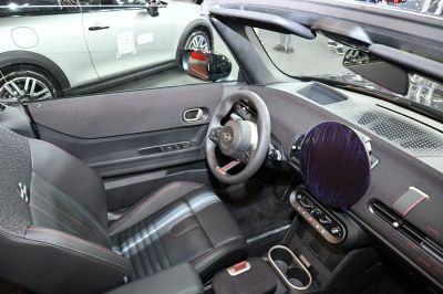 Modern car interior with sporty steering wheel and seats