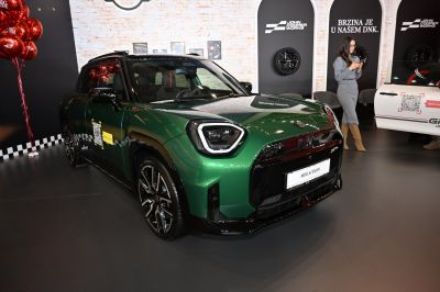 Green Mini with distinctive LED headlights and sporty front styling