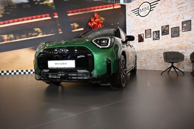 Front view of modern compact SUV with LED headlights and detailed grille