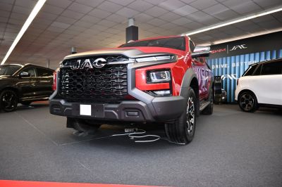 Bold front grille and modern LED headlights of pickup truck