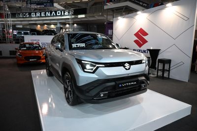 Front view of modern SUV with LED headlights and bold grille