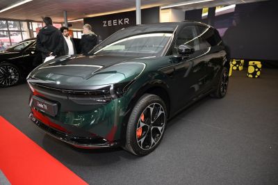 Electric SUV front angled view with LED headlights and alloy wheels