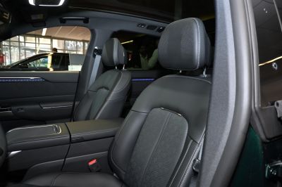 Premium front seats with leather upholstery and detailed stitching