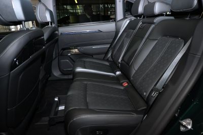 Premium rear seat with leather upholstery and seat belts.