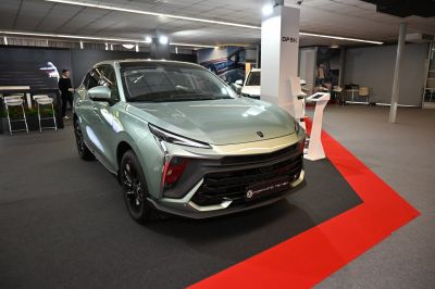 Front view with angular headlights and bold grille design