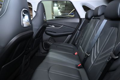 Spacious rear seats with black upholstery and contrast stitching