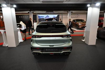 Sleek rear design with quad exhaust tips and modern taillights