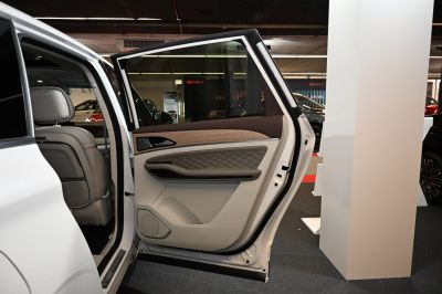 Rear door interior with quilted leather and wood trim
