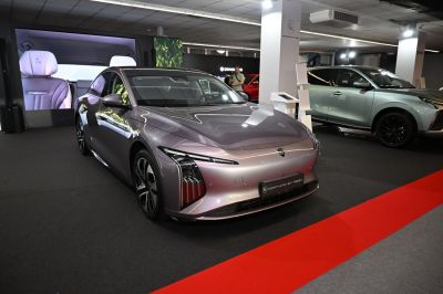 Sleek front view of sedan with modern LED headlights