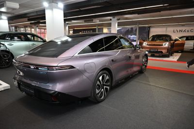 Sleek rear with full-width tail lights and smooth aerodynamic design.