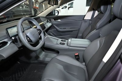 Modern car interior with digital displays and ergonomic seats