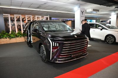 Modern front grille and rear sliding doors of luxury minivan
