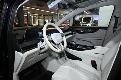 Digital dashboard and modern steering wheel in a vehicle interior