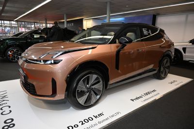 Sleek electric SUV with aerodynamic shape and LED headlights