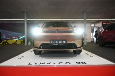 Front view of vehicle with LED headlights and modern grille