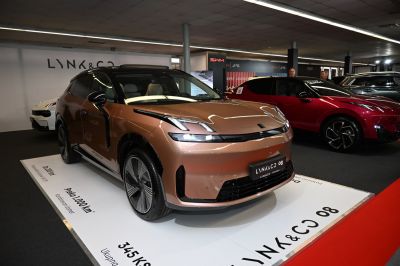 Front three-quarter view with LED headlights and prominent alloy wheels