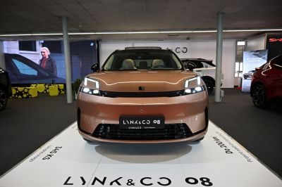Front view with distinctive LED headlights and modern sleek design