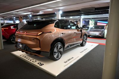 Rear view with LED tail light strip and sleek SUV design