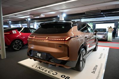 Rear view of sleek modern SUV with LED taillights.