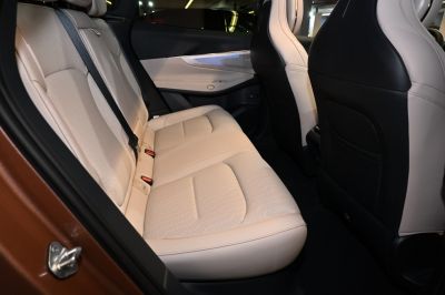 Beige perforated leather rear seats with seat belts