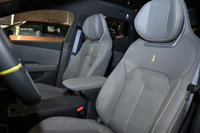 Gray leather front seats with detailed stitching and armrest