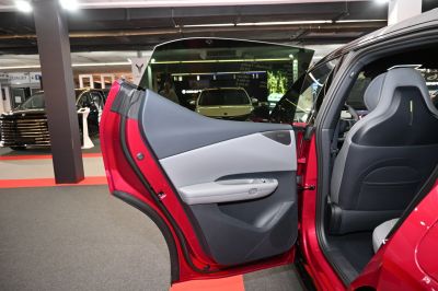Rear passenger door interior panel with modern design and seating