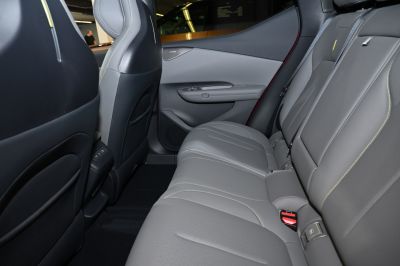 Spacious rear leather seats with detailed stitching and door panel