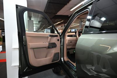 Interior door panel and front cabin with premium materials and design.