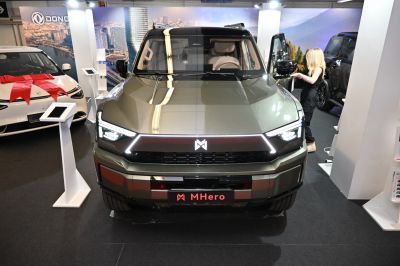 Front view with LED daytime running lights and bold grille design